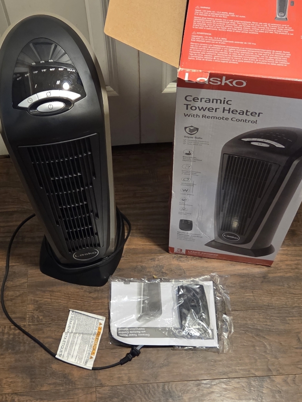 Lasko 1500W Ceramic Tower Space Heater with Remote, Thermostat, Timer & Widespre